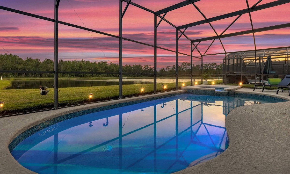 Indian Point Villa | Lakefront Family Getaway with Pool and Game Room. Minutes to Disney!