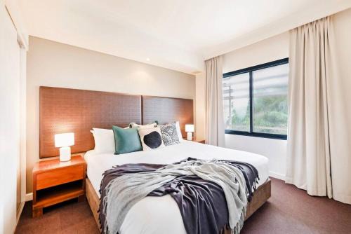 Darwin City Centre Apartment | Poolside Resort Living on Esplanade with Balcony