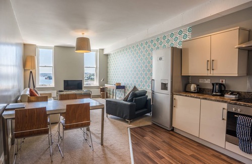Torquay City Centre Cottage | 12 Astor House - one bed garden apartment with patio and stunning uninterrupted sea views