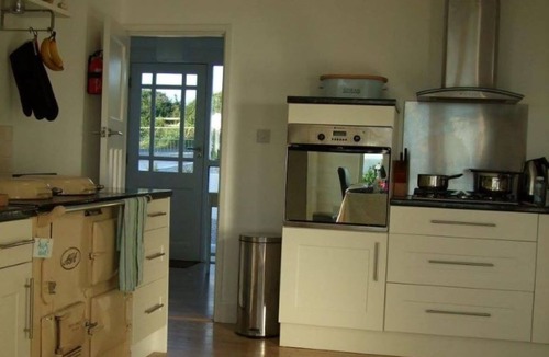Trenance Cottage | Coast Cottage - stunning sea views & large garden. Dog friendly family home