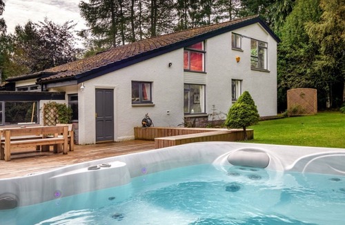 Dulnain Bridge Cottage | Four Pines Lodge - a house that sleeps 8 guests in 4 bedrooms