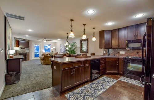 Lake Delton Condo | Luxurious Getaway Condo on Lake Delton w/Stunning Views + Private Sandy Beach