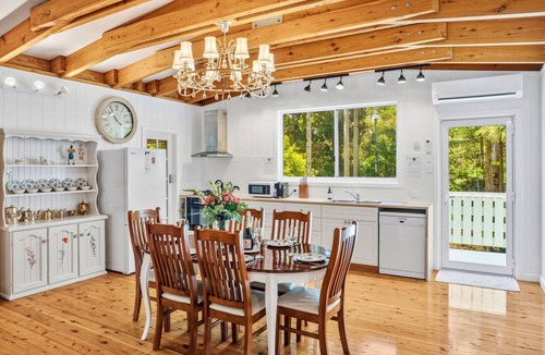 Springbrook House | Luxury Romantic Rainforest Cottage, waterfall area, firepit, fireplace.