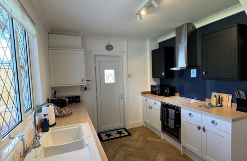 Ferring Cottage | Ocean Cottage, Ferring - seaside cottage with driveway, games room & EV charger