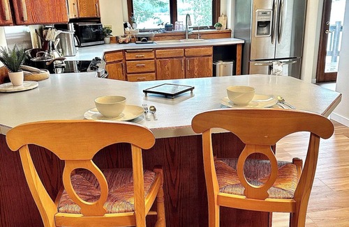 Kalispell House | Peaceful Island Retreat on Foys Lake MT – Hot Tub, Private Dock, Beach & Kayaks!