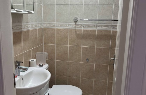 Longcroft House | Peaceful private entrance, 1 minute walk to shops, bus stop; access to 26 bus.