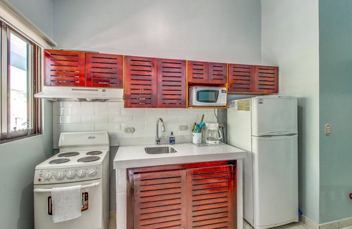 Coco Apartment | Recently Remodeled Condo with WiFi & Pool - Walk to Beach & Restaurants