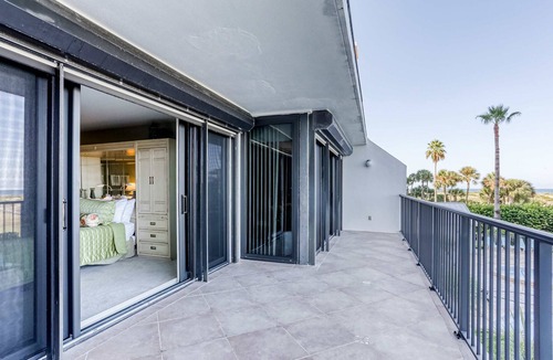 Sand Key House | Second floor condo with pool and tennis court private WD and central AC