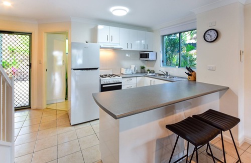 Hamilton Island Apartment | Sunset Waters 01 - Marina Side 2 Bedroom with buggy.