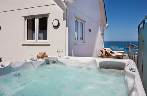 Portreath House | Superbly appointed accommodation, and a soothing hot tub on the decked balcony.
