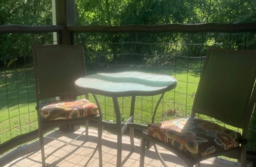 Landrum House | Surrounded by sweetgum and maple trees, this house is perfect for some R & R.