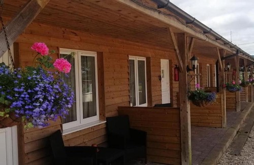 Windmill Hill Hotel | The Flying Fish Stables