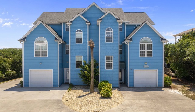 2nd Row Duplex with elevator, views, community pool, and direct beach access.
