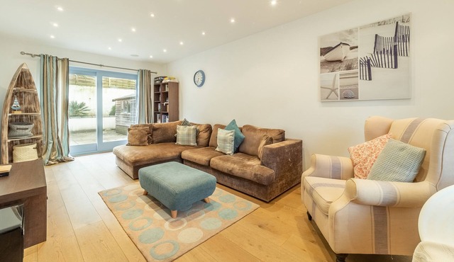 A fabulous beach house, just a stone’s throw from the sandy beach.