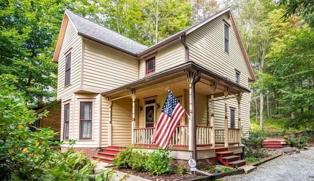 A large inviting deck beckons you to "Victoria" in Eagles Mere in Eagles Mere