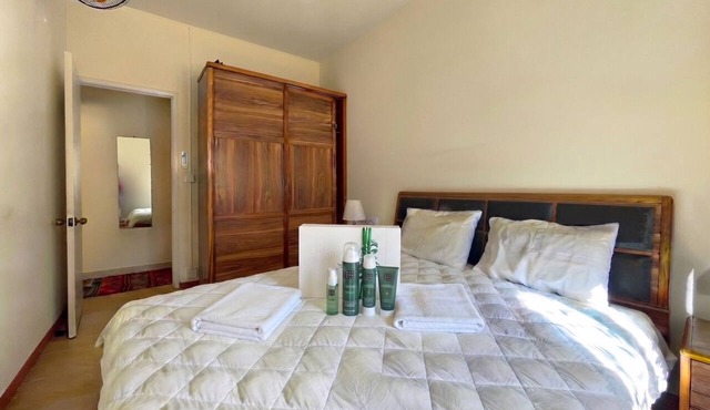 Beach Walk Apartment with Private Garden & Wifi