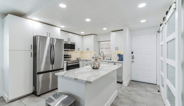 Beachfront 2 bedroom, 2 bathroom renovated condo, pool, hot tub, private beach!