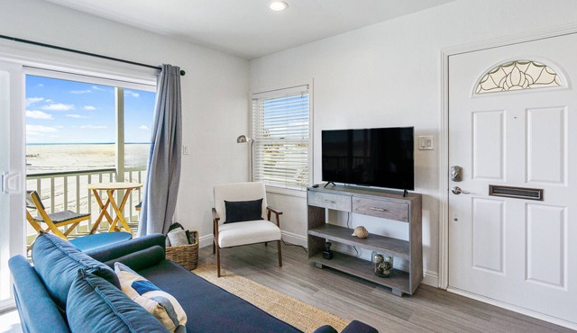 Beachfront home with boogie boards and enclosed back yard