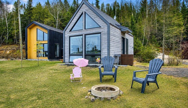 Peaceful Lakeside Cabin Retreat with Beach, Fire Pit & Kayaks