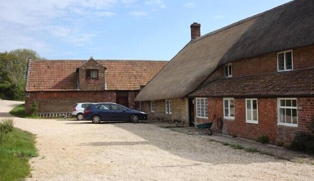 Coastal 6 bedroomed property set in farmland.