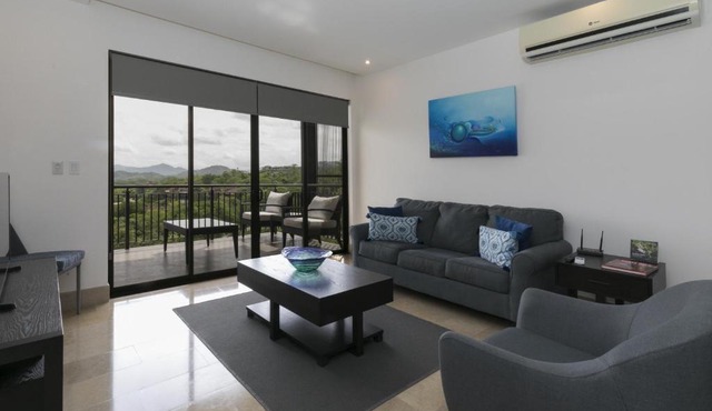 Cozy 1BR Condo with Partial Ocean View - Roble Sabana - Reserva Conchall