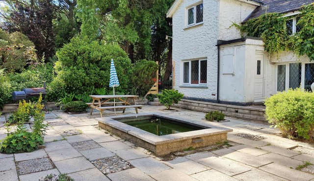Croft Cottage, set in acres of mature gardens