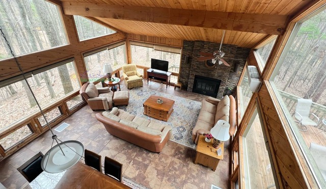 Lodge-style multi-level home at the Homestead in Glen Arbor. Deck with grill.