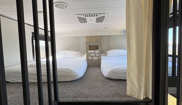 Luxury camper with a spectacular view, surrounded by nature.