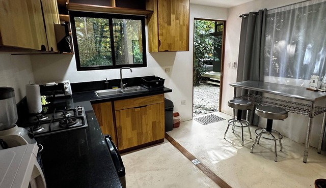 Modern Casita in the jungle. Steps to the Beach.