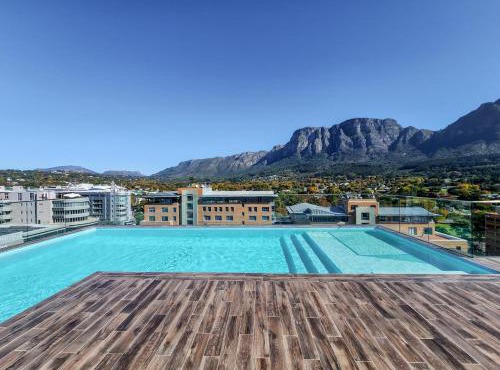 Newlands Peak Modern 1BR - Pool Gym Workspaces