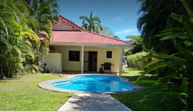 Riverside oasis with private pool and backyard. Walking distance to the beach.