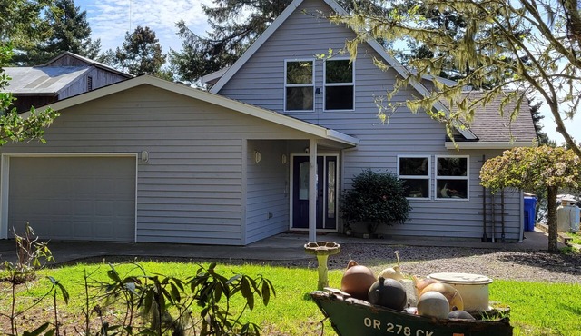 Very quiet Pacific City home with amazing river views from the deck!